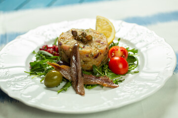 tartar spread with fish, anchovies and vegetables