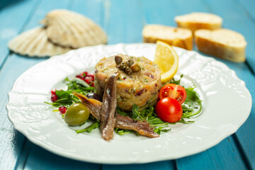 tartar spread with fish, anchovies and vegetables