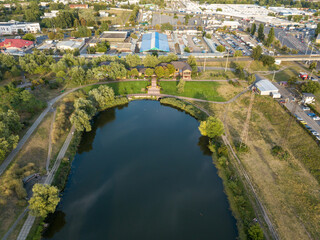 Fototapeta premium Aerial drone view. Lake in the city park of Kiev.