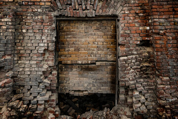 a door in the textured wall, bricked up. atmospheric background and symbol of hopelessness
