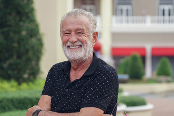 Caucasian Senior man with beard mustache smile and standing looking at camera