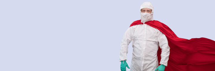 A doctor in a costume of a super hero stands on defense against a viral pandemic