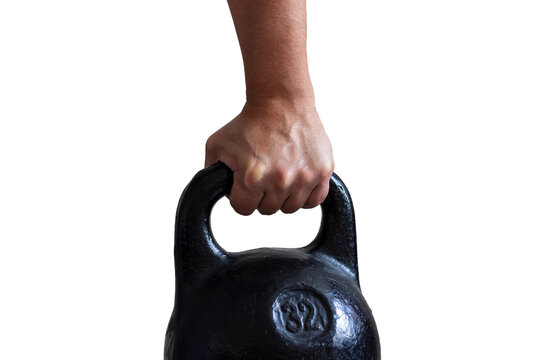 Male Hand Holding Black Cast Iron Sports Kettlebell Isolated.