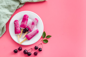 Fresh cherry berries ice cream. Popsicles overhead view