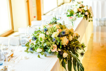 Closeup on table set for an event party or wedding reception lovely background.