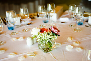 Closeup on table set for an event party or wedding reception lovely background.