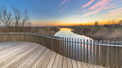 View from Planking balustrade over swamp at sunset