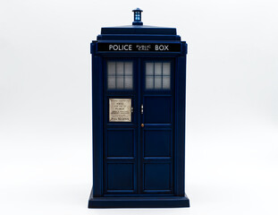 Police call box in front of white background. Tardis from Doctor Who.
 - obrazy, fototapety, plakaty