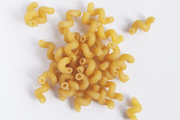 A bunch of pasta isolated on a white background. Italian macaroni close-up.