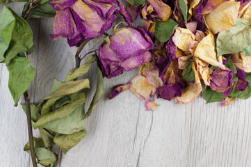 bouquet dried roses on old wood background with copy space