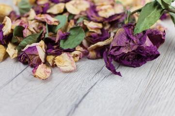 bouquet dried roses on old wood background with copy space