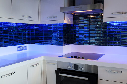 Modern Black Induction Stove With Hood. Energy Efficient Electric Hob With Built-in Oven At Home Kitchen . Close Up, Copy Space, Background, Top View.