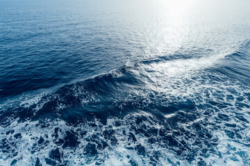 View to ocean waves. Blue cristal clear water background