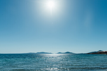 Fototapeta na wymiar Stunning view of Asinara coastilne bathed by a turquoise and transparent sea in Sardinia, Italy