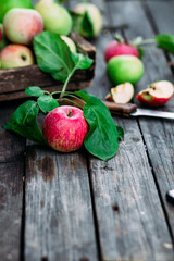 Ripe apples in a wooden box