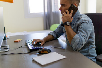 Young man working from home