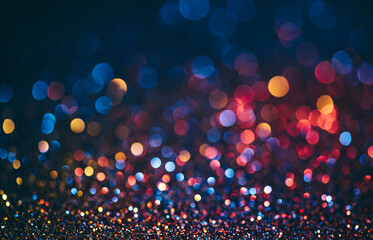 Abstract neon halftone color bokeh texture. Sparkling blur holiday light. Christmas nad new year eve blurred background.
