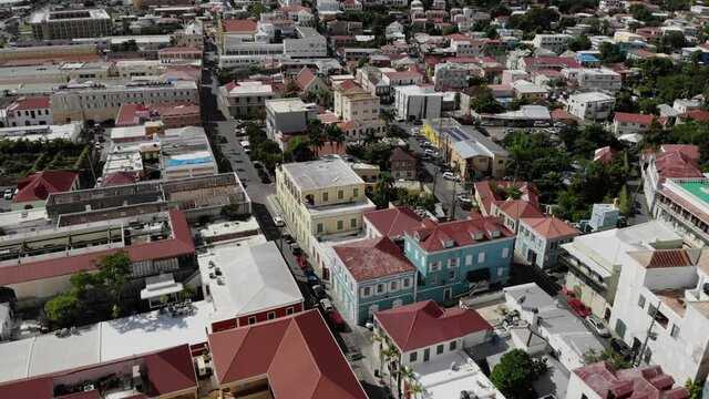 Aerial view of Charlotte Amalie downtown in St Thomas, USVI. Slow dolly shot.