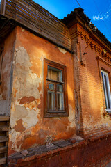 Windows of an old vintage house in the afternoon on a sunny day