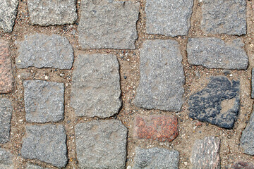 old cobblestone road pavement texture