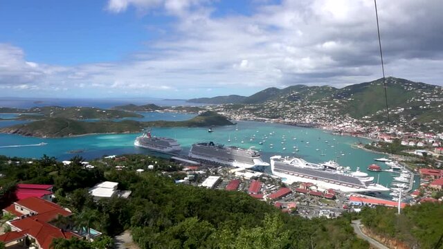 St. Thomas / US Virgin Islands - May 2019: A view on the harbor with docked luxury cruise ships from the top of the Paradise Point. 