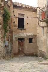Fototapeta na wymiar old building in an alley in the old town of agricola, cilento national park, salerno province, campania, italy