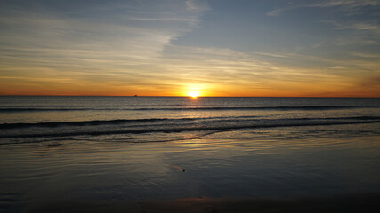 Fototapeta na wymiar Sunset over the ocean at Cable Beach near Broome, Western Australia.