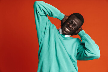 Happy african man wearing casual clothing laughing