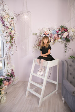 Little beautiful girl with cat ears. Copy space.