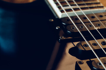 Close up photo of electric guitar fingerboard