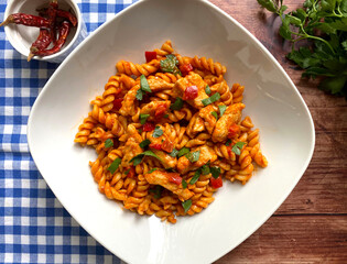 Paprika chicken. Classic Hungarian chicken paprikash with fusilli pasta and parsley. 