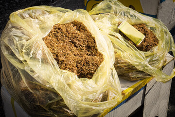 The illegal trade of contraband tobacco on the street market in Konjic, Bosnia and Herzegovina