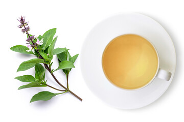 Cup of herbal tea with sweet basil leaf