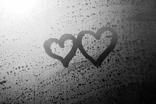 Valentine's day blurred love heart on window.