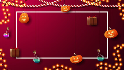 Halloween blank red template for your arts with blank line frame, pumpkins Jacks, presents and flask of potion tied with ropes hanging near the wall
