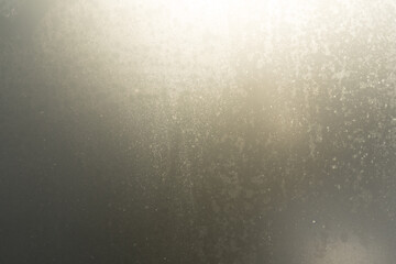 Closeup on fogged blurry glass textured background.