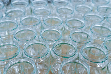 empty glass jars ready for canning - food industry background