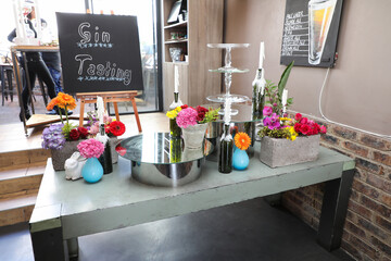 Sign saying Gin tasting on a chalk board.