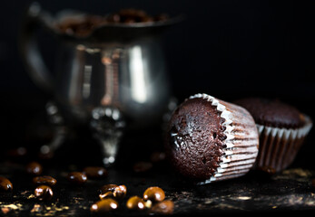 tasty chocolate brownie cupcake on dark background