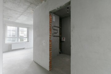 interior of the apartment without decoration in gray colors
