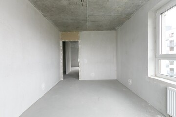 Fototapeta premium interior of the apartment without decoration in gray colors