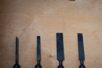 chisels on a wooden table