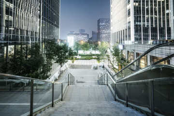 City square and modern high-rise buildings, night view of Jinan, China.