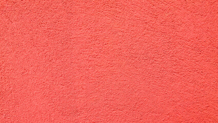Coral background. Rough texture. Red-orange background