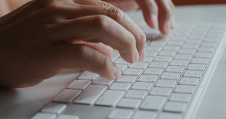 Man type on computer keyboard
