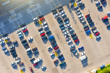 Open air parking for residents of the area, top aerial view from high.