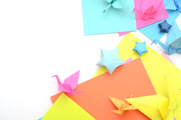 Origami objects folding on white background