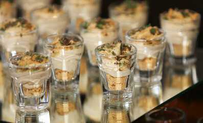 Mint cream cake in a glass dish for an event.