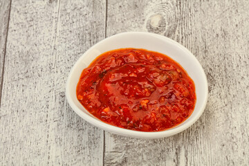 Tomato spicy sauce in the bowl