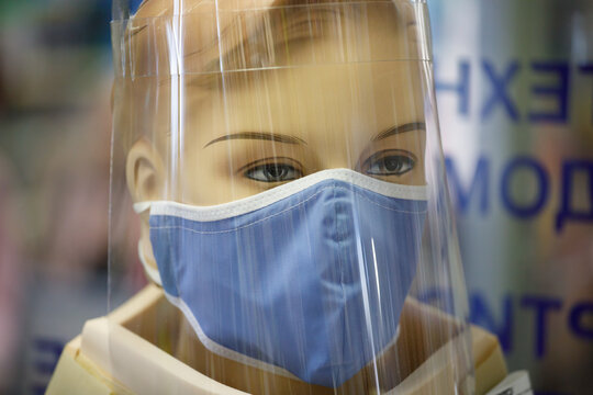 mannequin in protective mask and protective screen - Powered by Adobe